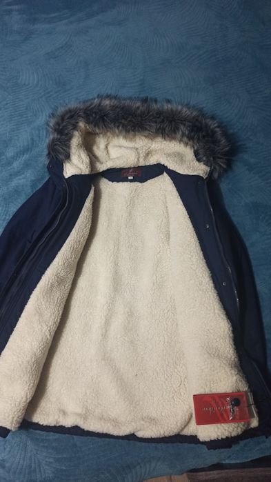 Продам теплую парку 52-54 р