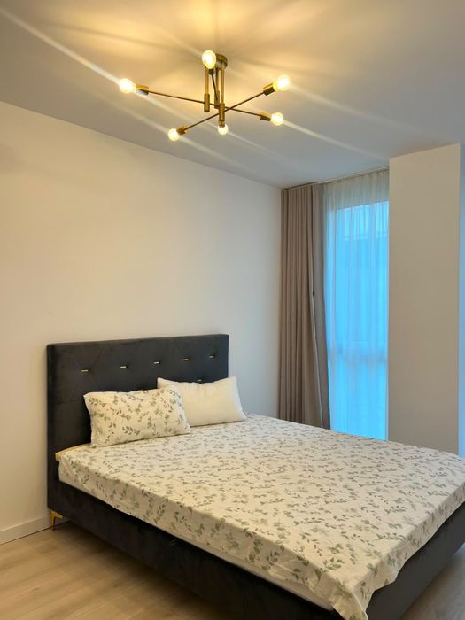 Apartament modern de inchiriat 2 camere, living cu bucatarie si dormitor, 58mp, curte, incalzire pardoseala, AC, dressing