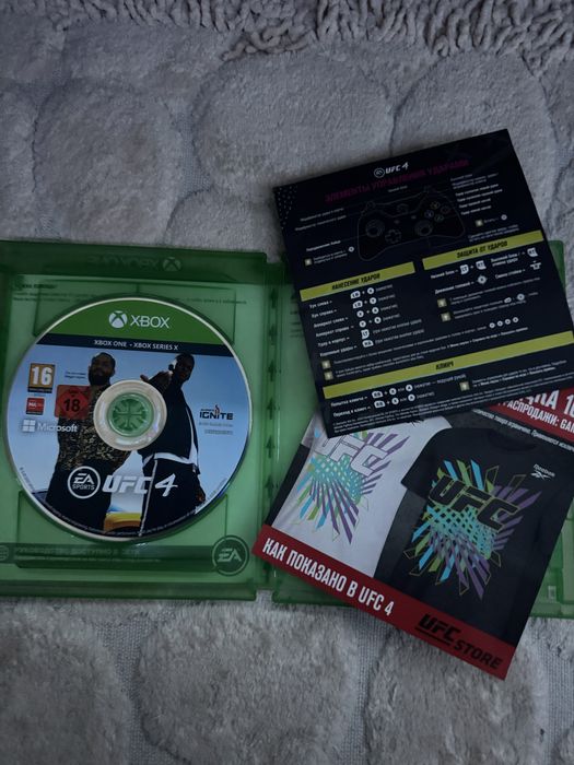 Продам игровой диск UFC 4