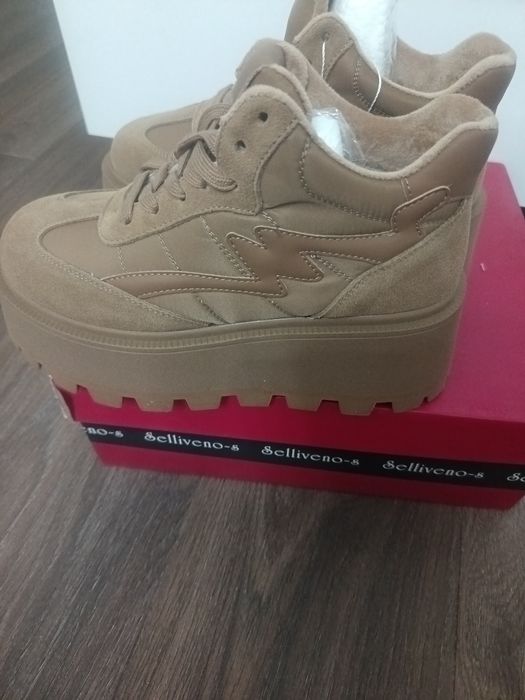 Новый киілмеген аяқ киім