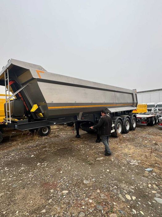 Полуприцеп УАТ самосвальный объемом 27 м³