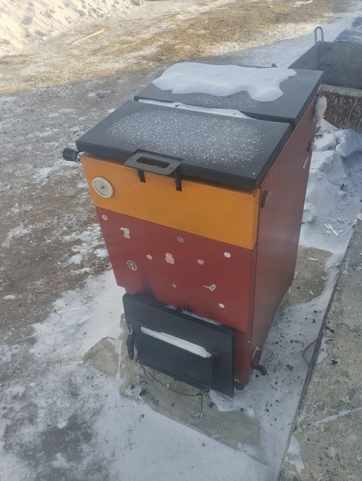 Продам котел твердотопливный