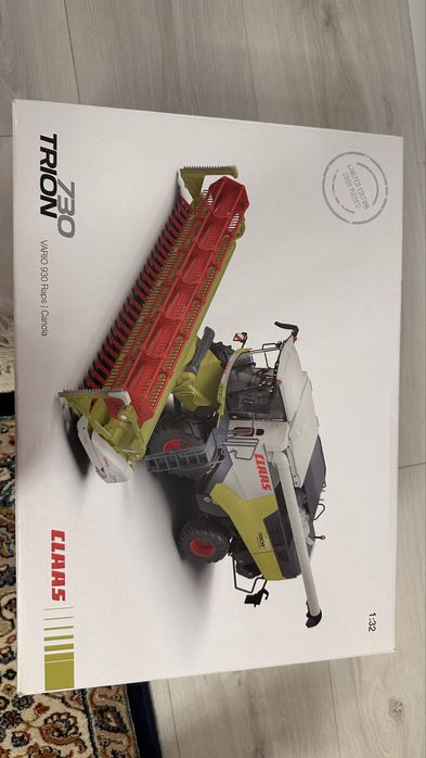 Продам игрушечный комбайн