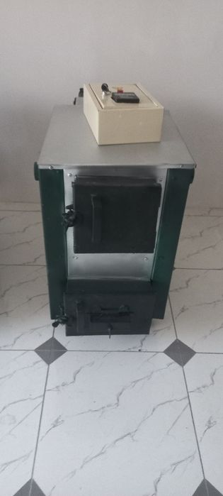 Котёл uy isitgich gaz svet kòmir  g'òza poya ..