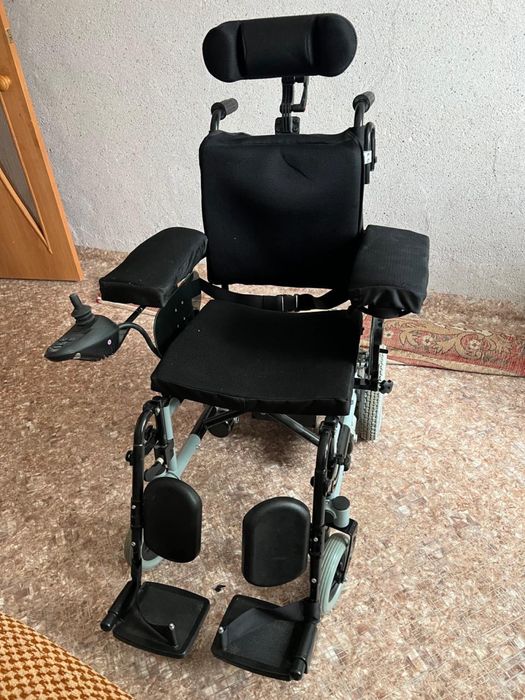 Электрическая инвалидная коляска