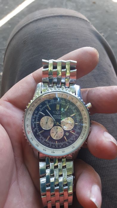 часы Breitling Navitimer.