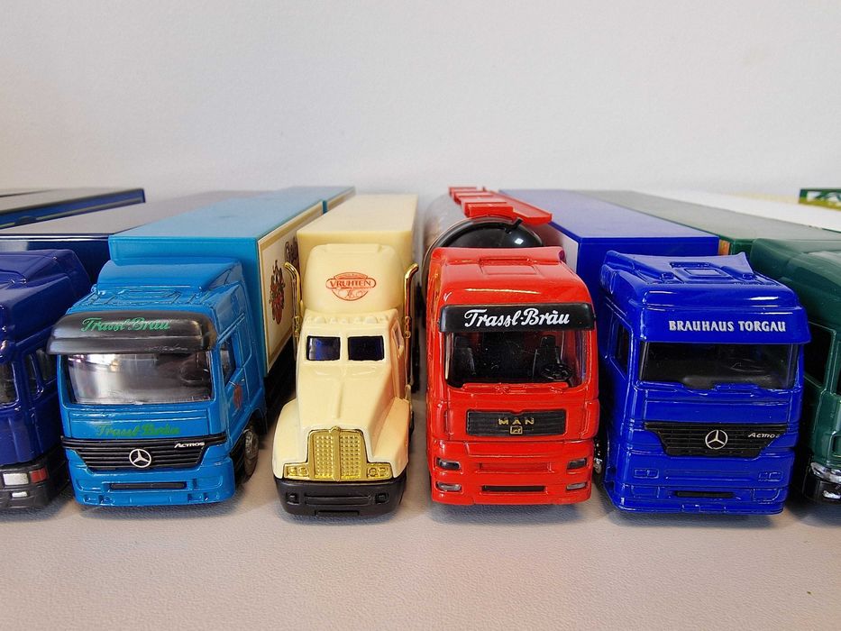 Set 12 camioane jucarie, lungime 15–22 cm, cabină metalică