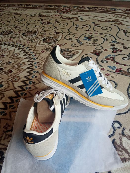 Новый кроссовки купил в России