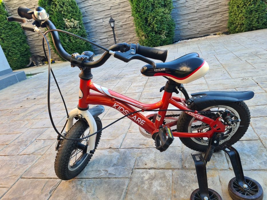 Bicicletă copii Kidscare 12 inch – stare foarte bună + roți ajutătoare