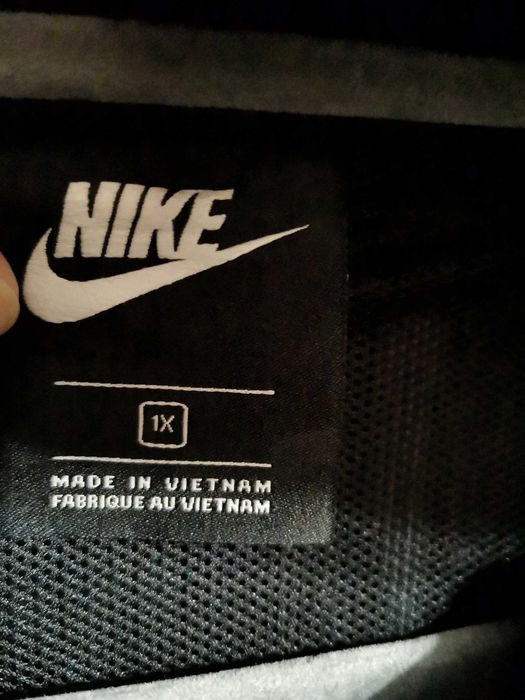 Nike NSW WINDRUNNER Cargo Rebel Jacket IN Black.