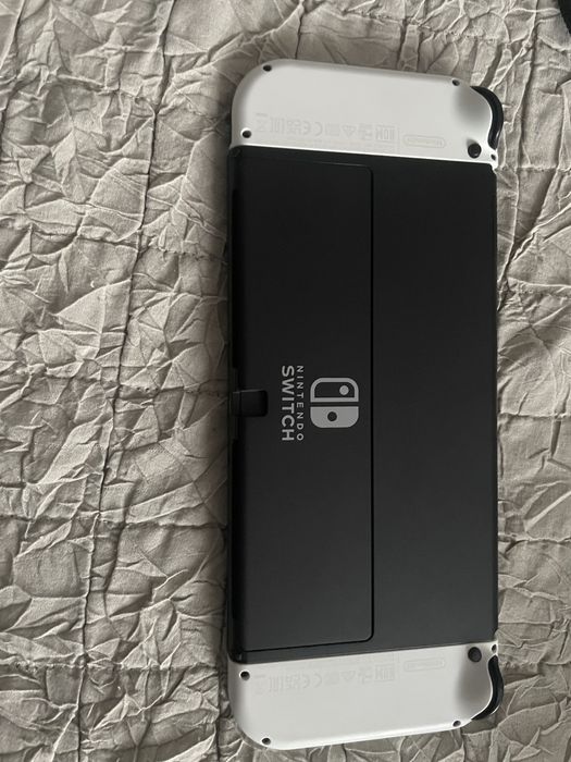 nintendo switch oled stare perfecta folie+husa de tinut si 2 jocuri