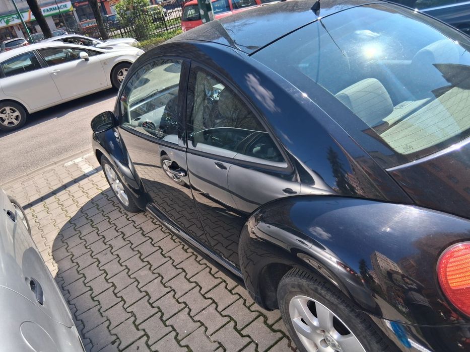 schimb vw new beetle
