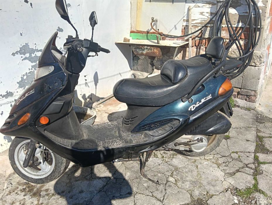 Скутер Кумко Динк 150