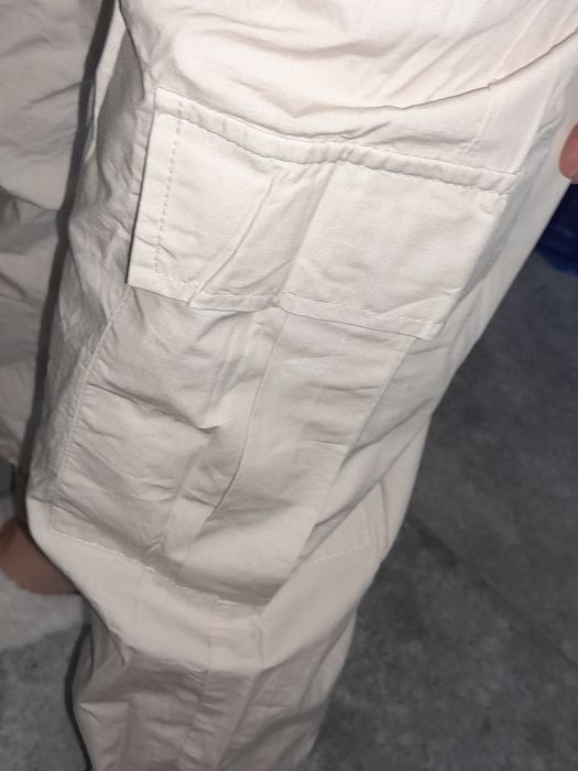 Бежевые брюки от LC WAIKIKI