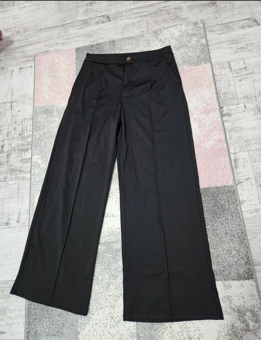 Pantaloni largi femei