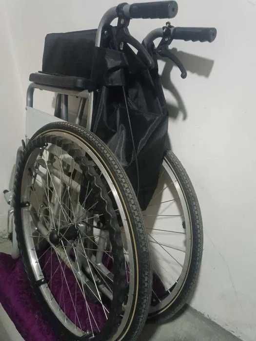 г.  Инвалидный коляска 75