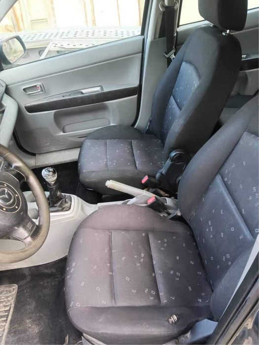 Mazda 2 - на части