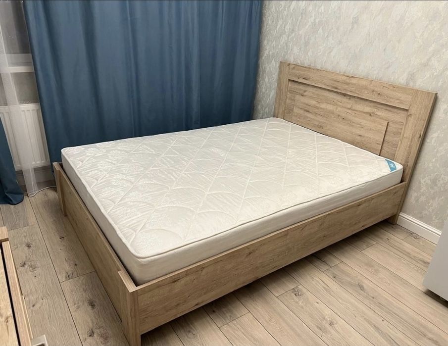 Продам кровать 145х200 с ортопедическим матрасом.Производство Беларусь