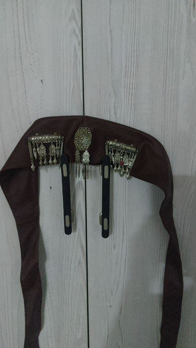 Шапан белдігімен