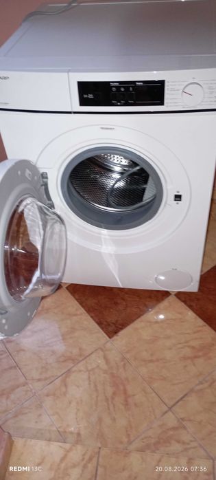 masina de spalat rufe SHARP este ca noua si muult sub pret