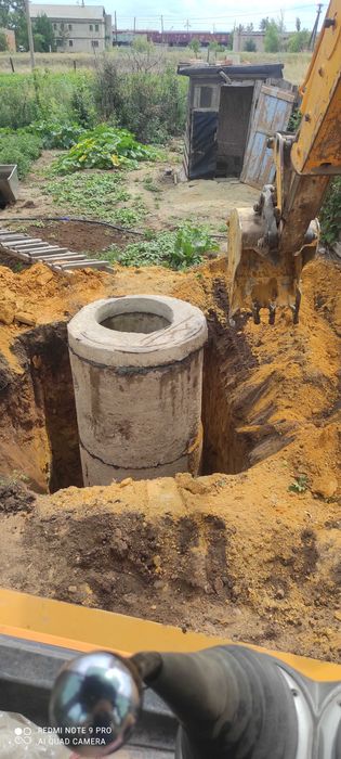 Услуги экскаватора-погрузчика