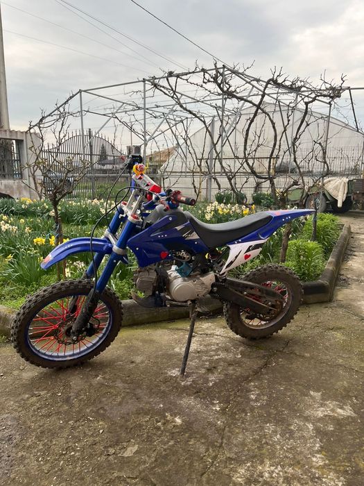 Vând moto cross că și nou