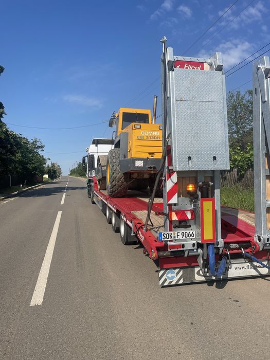 Transport utilaje, marfa, agregate,inchiriere trailer