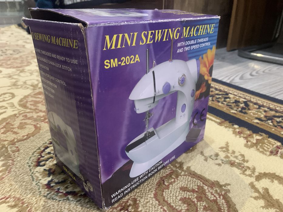 Швэйная машина  модель SM-202A