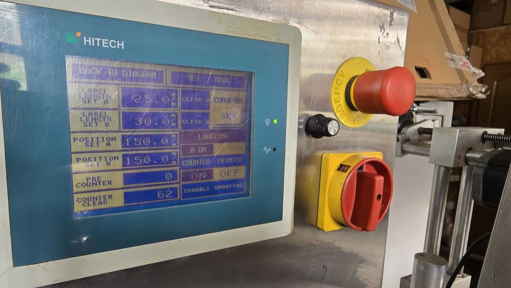 Linie automata de etichetare Fountain Food Machinery din inox
