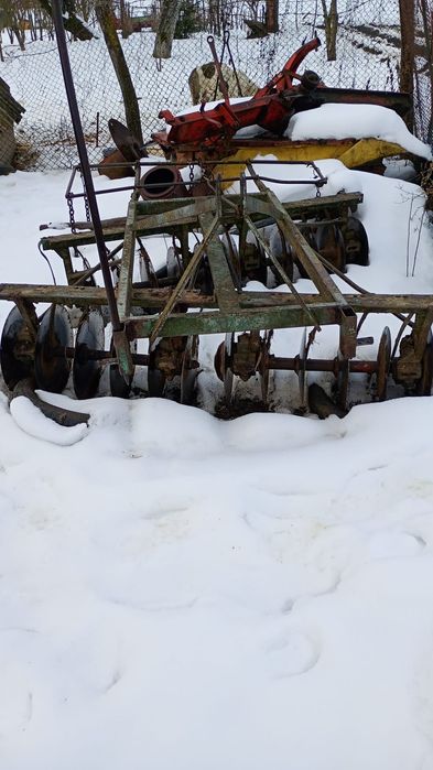 Disc agricol purtat în tiranți