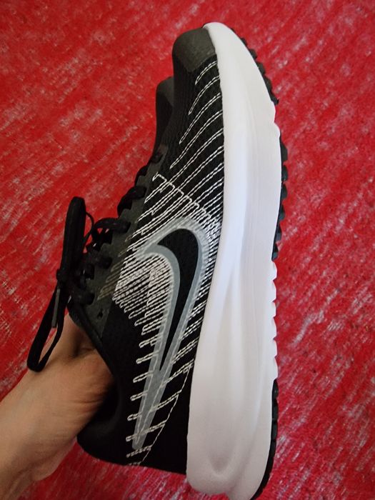 Vand adidasi Nike Run Defy femei