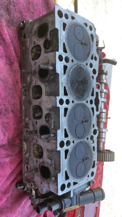 Chiulasă completă VW Passat B6 2.0 TDI BMP + ax cu came + injectoare + pompă vacuum/tandem