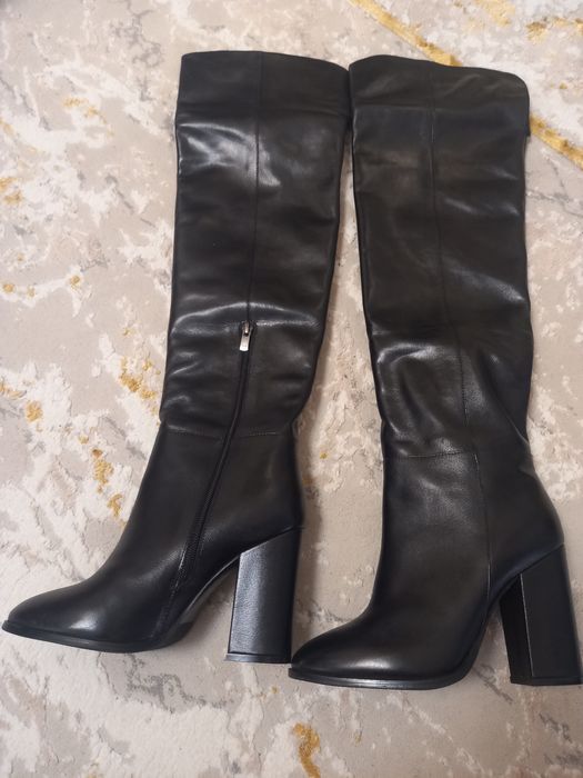 Продам зимние сапоги новые