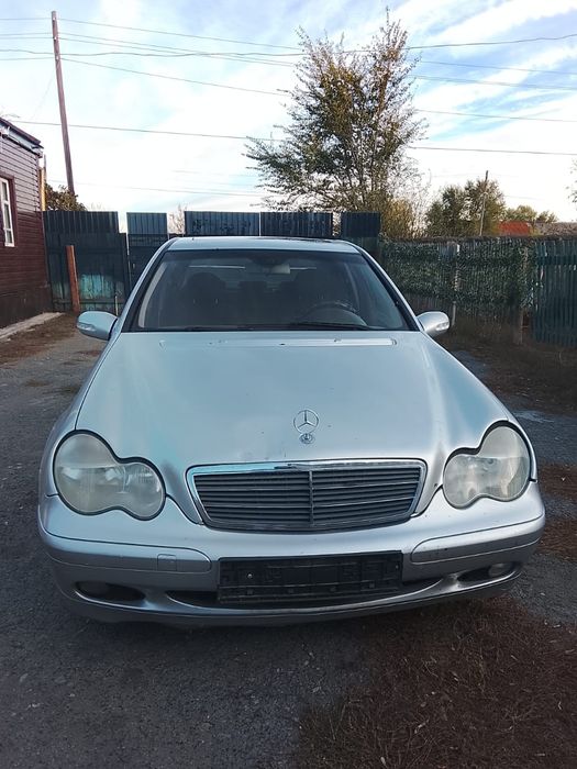 Мерседес Бенц W203