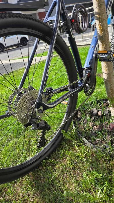 Bicicletă MTB Romet Mustang M5 XL/21 inch, roți 29”, Shimano Deore, practic nouă