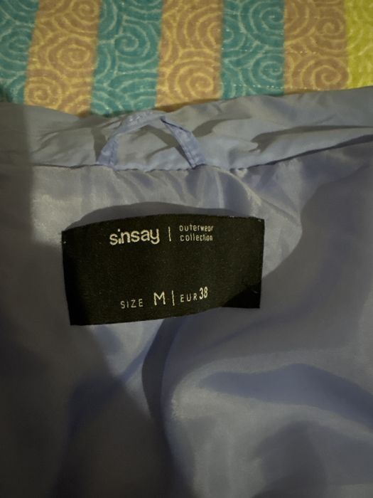 Продаи куртку голубую