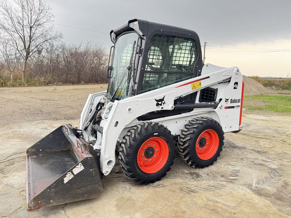 Mini încarcator frontal Bobcat S450. Ca nou , cu 700 ore impecabil .