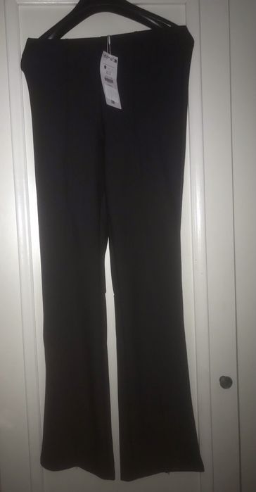 Pantaloni evazati
