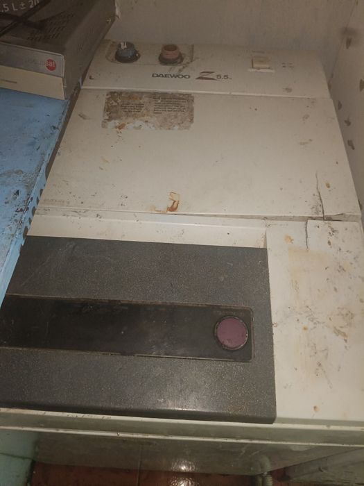 Masina de spalat rufe automata 5 kg functionala cu incarcare pe deasupra, tinuta in garaj. Negociabil.