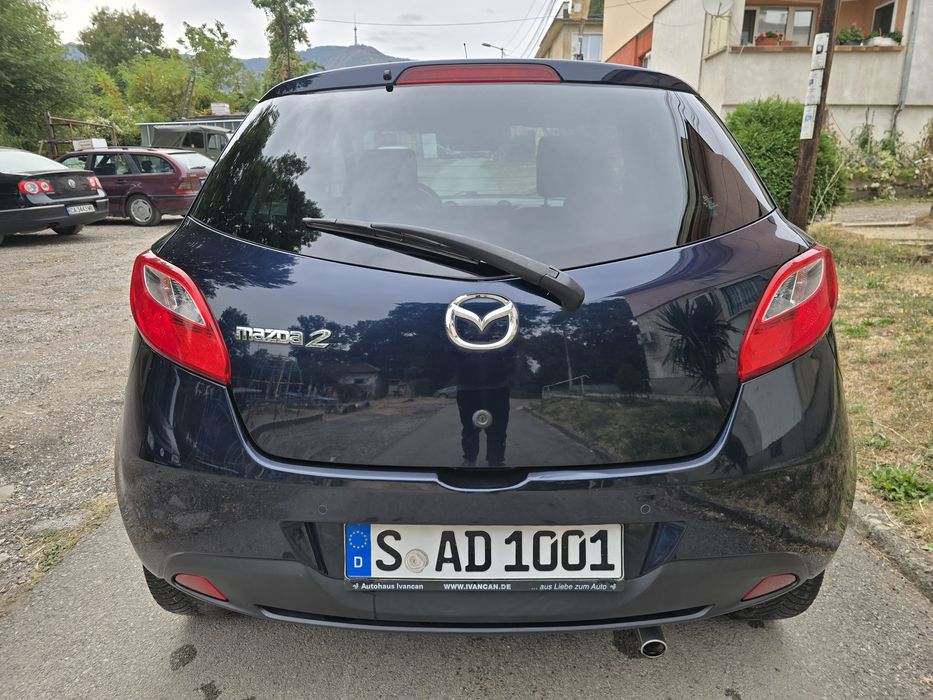 Mazda 2 От Германия 102000км.4цилиндъра. 4врати.Навигация