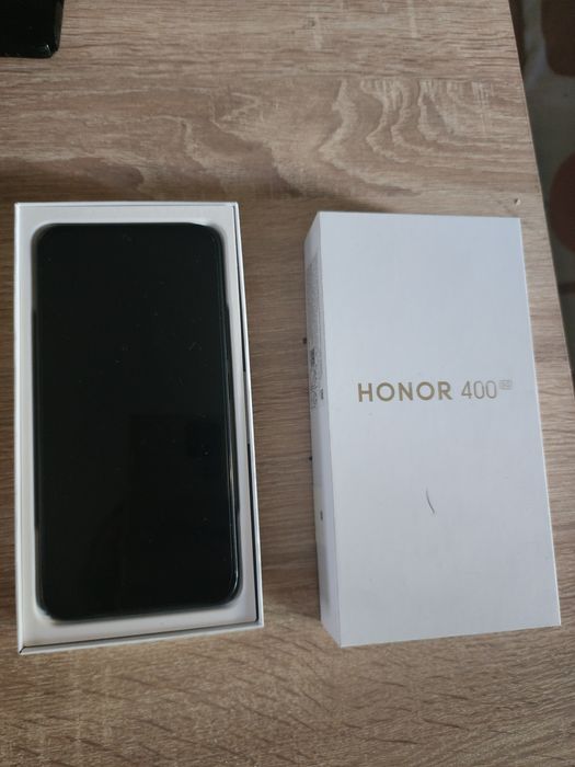 Vând honor 400.impecabil.