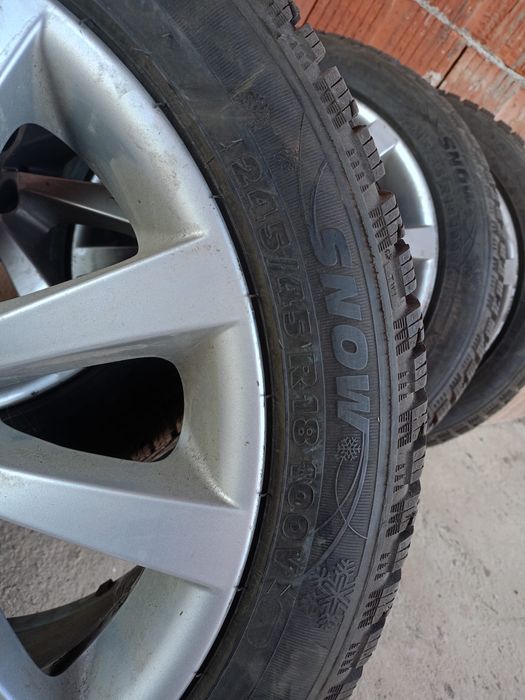 Jante Bmw F10/ F11 R18 245/ 45/ 18 cu anvelope de iarna aproape noi