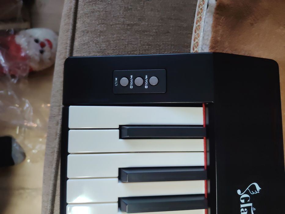 Orga / pian portabil incorporat cu bluetooth