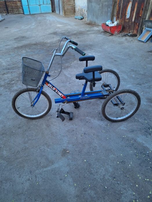 Велосипед трех колесный