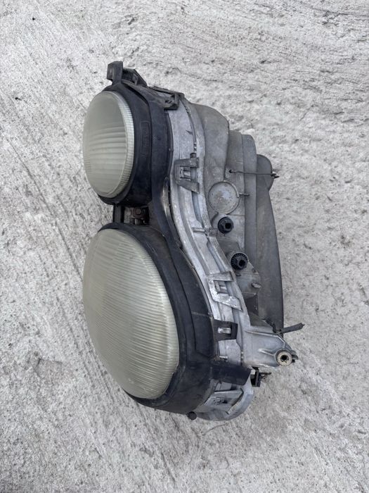 Фара на Мерседес  210 дорестпйлинг левая