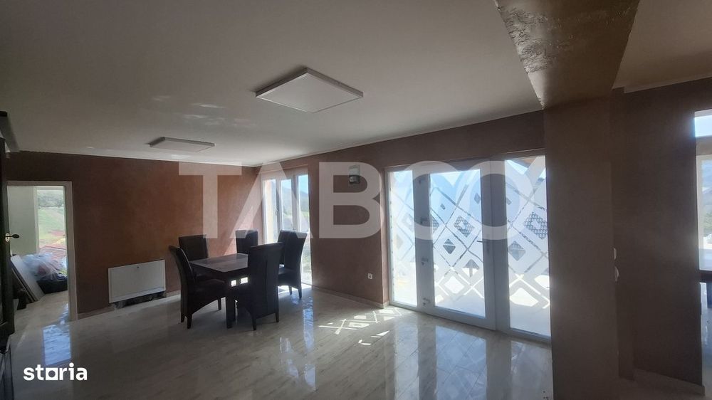 Casa de vanzare 405 mp utili 2 garaje 250 mp terase Slimnic Sibiu