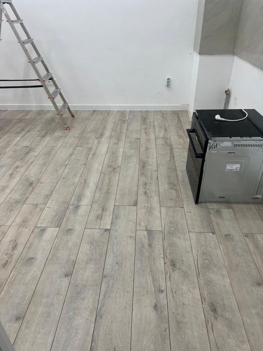 Ламинат (на 2 комнаты)