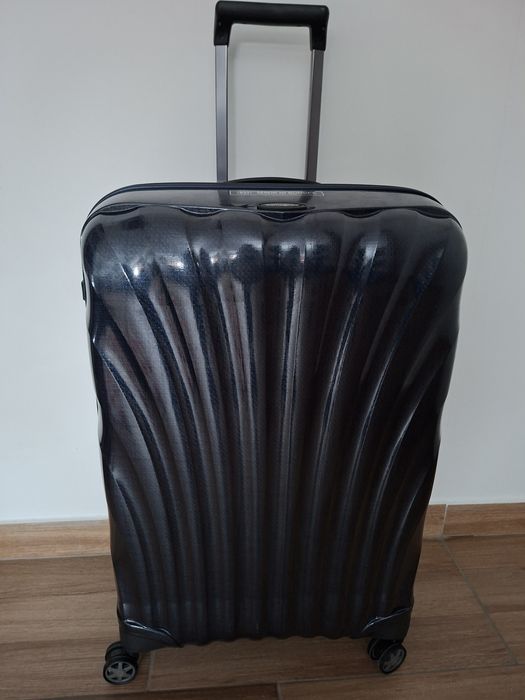 Vând troler Samsonite, nou.