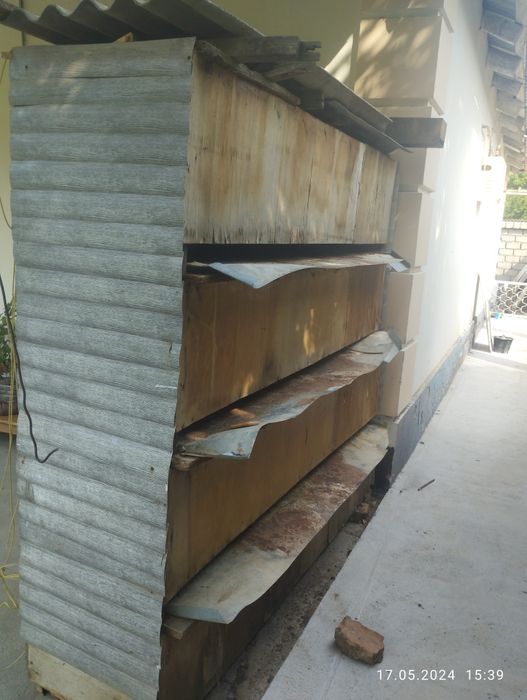 Клетка  для кролей  четырёх ярусная восемь домиков .