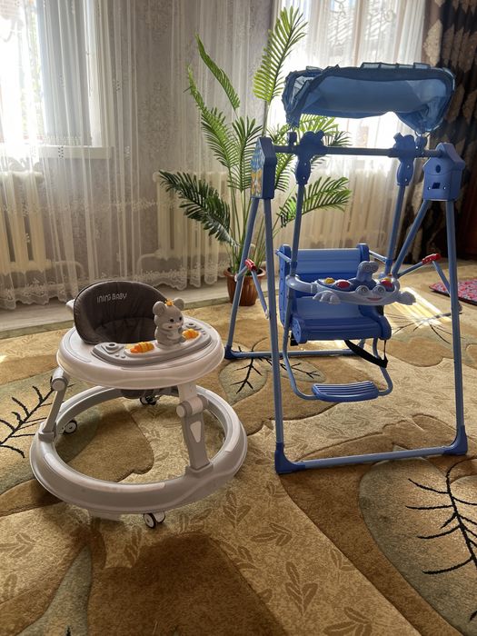 Детская качеля ходунок